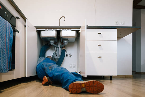Professional Drain Cleaning technician working in Barker, TX